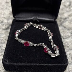 Elegant Silver and Pink Gemstone Bracelet with hearts